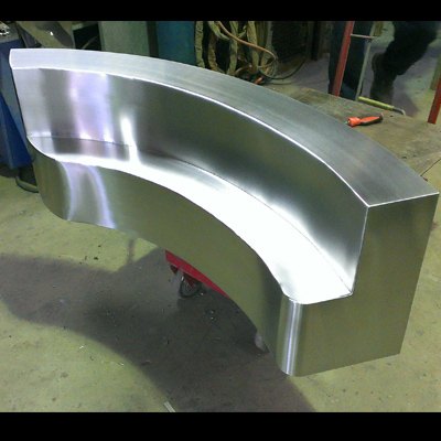 Curved stainless steel bench