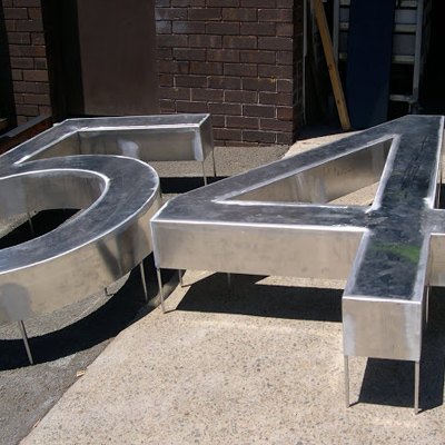 Large fabricated steel street numbers for signage